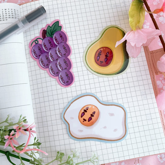 Blursed No-Face Noms | Laminated Vinyl Sticker Pack (3 Stickers) | Egg No-Face, Avocado No-Face, Grape No-Face